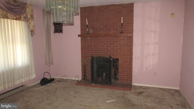 unfurnished living room featuring a baseboard heating unit, a fireplace, and carpet flooring