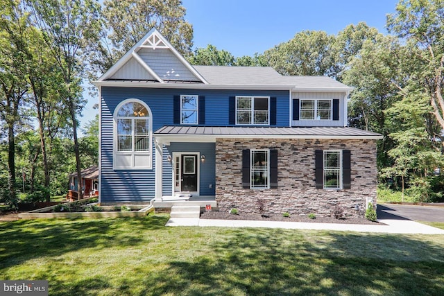 view of front of home featuring a front yard