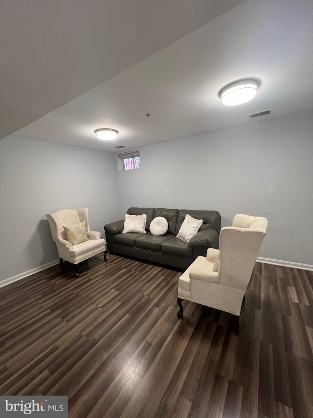 living room with dark wood-type flooring