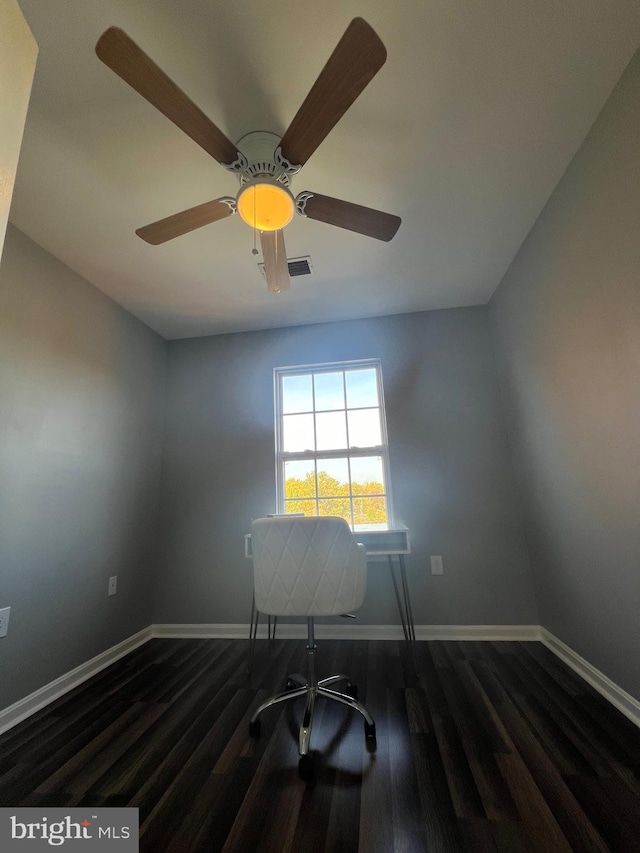 office area with ceiling fan and dark hardwood / wood-style flooring