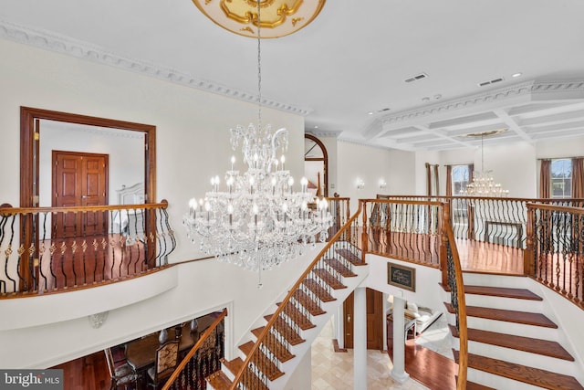 dining area with recessed lighting, a notable chandelier, coffered ceiling, visible vents, and beamed ceiling