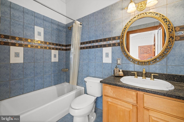 full bath featuring toilet, vanity, tile walls, tasteful backsplash, and shower / bath combo