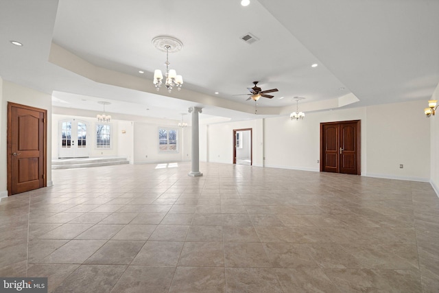 unfurnished living room with light tile patterned floors, recessed lighting, visible vents, baseboards, and a raised ceiling