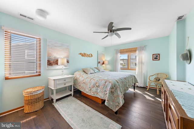 bedroom featuring ceiling fan and dark hardwood / wood-style flooring