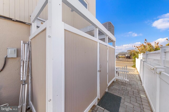 15 Weldon Pl, Long Beach Township, NJ 08008 - view of property exterior with fence