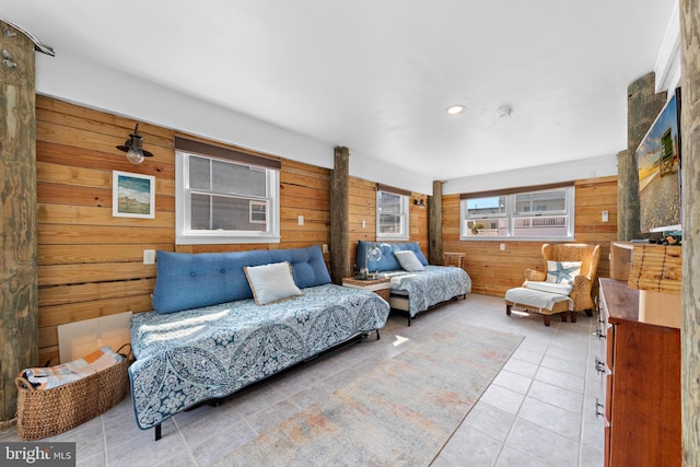 15 Weldon Pl, Long Beach Township, NJ 08008 - tiled bedroom with recessed lighting, a wood stove, and wooden walls