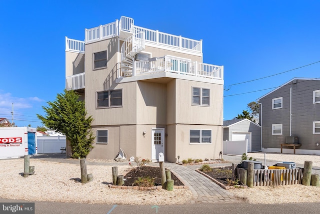 15 Weldon Pl, Long Beach Township, NJ 08008 - view of front of house with a detached garage and fence