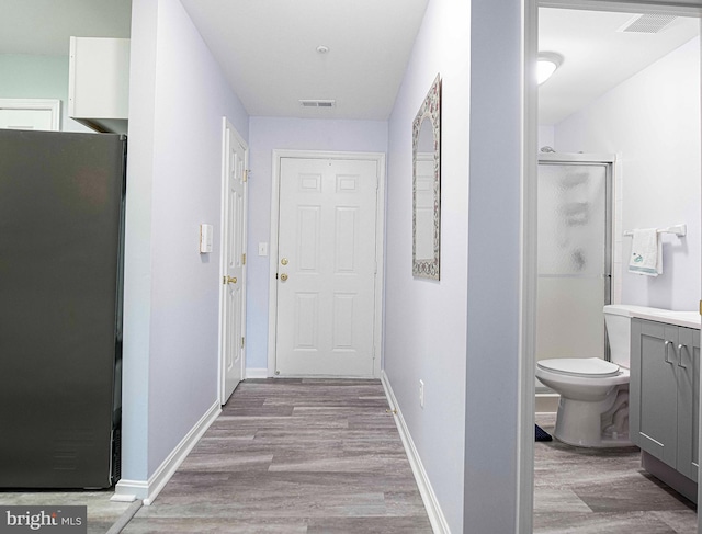 hallway featuring light hardwood / wood-style floors