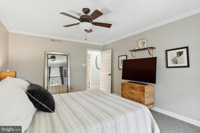 carpeted bedroom with crown molding and ceiling fan