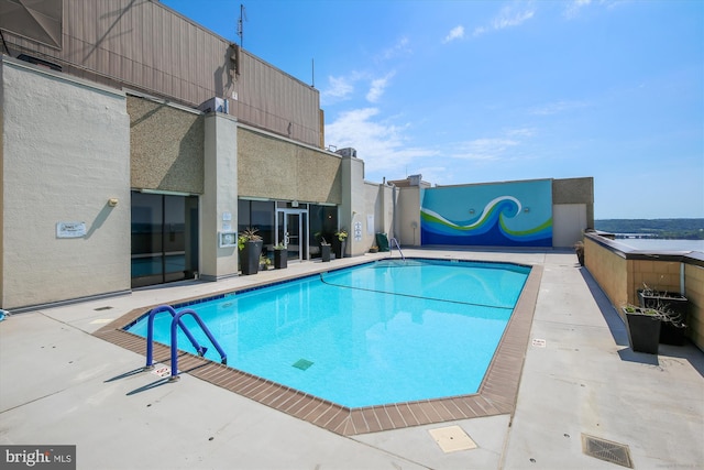 pool with a patio