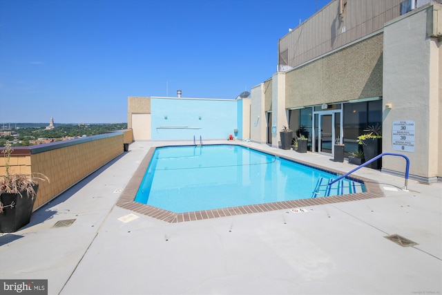 pool featuring a patio