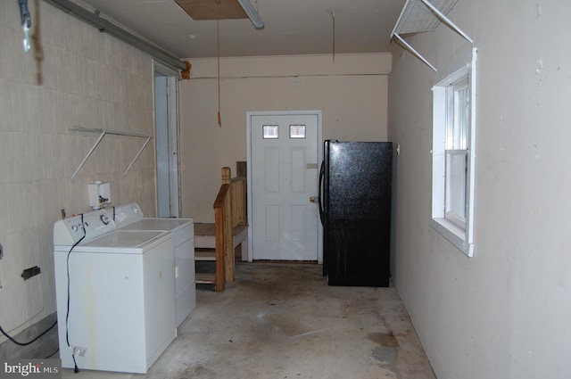 washroom featuring washer and dryer