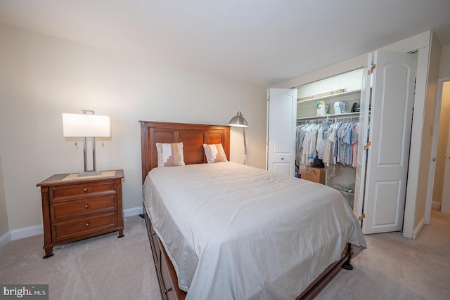 carpeted bedroom featuring a closet