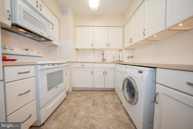 kitchen with decorative backsplash, white appliances, washer / clothes dryer, and white cabinetry