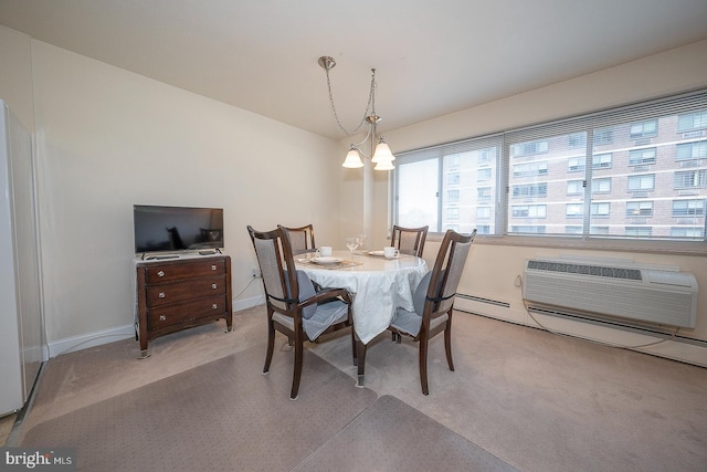 carpeted dining room featuring baseboard heating, an inviting chandelier, and a wall mounted AC