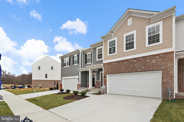 townhome / multi-family property featuring a garage