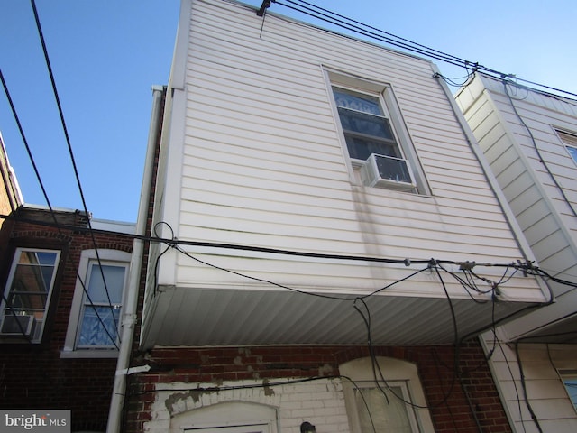 view of property exterior with cooling unit