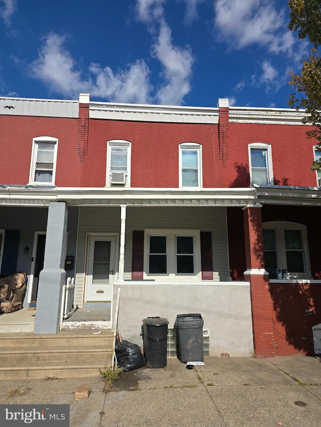 multi unit property featuring a porch