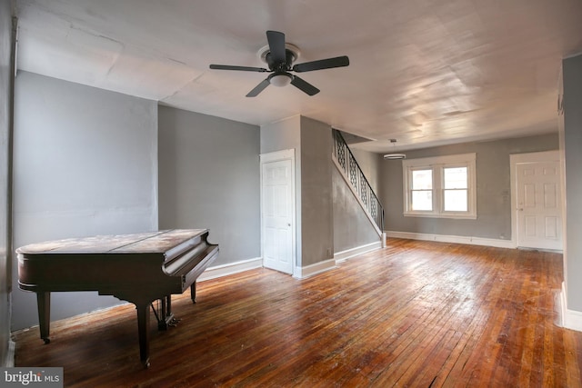 misc room with ceiling fan and hardwood / wood-style flooring