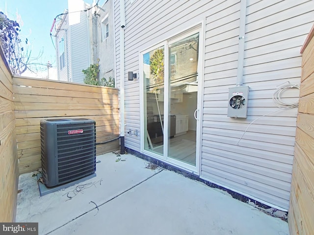 view of patio with central AC