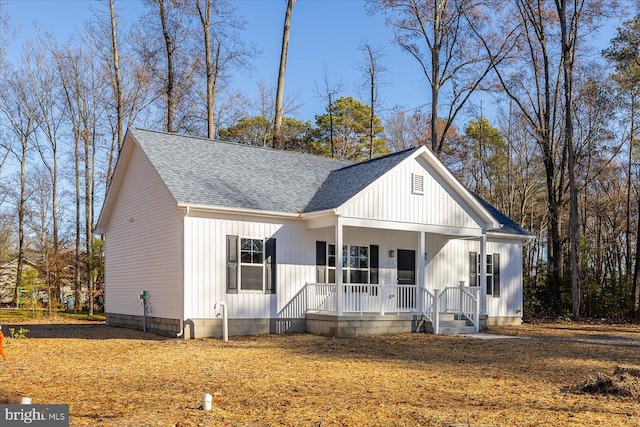 modern farmhouse with a porch