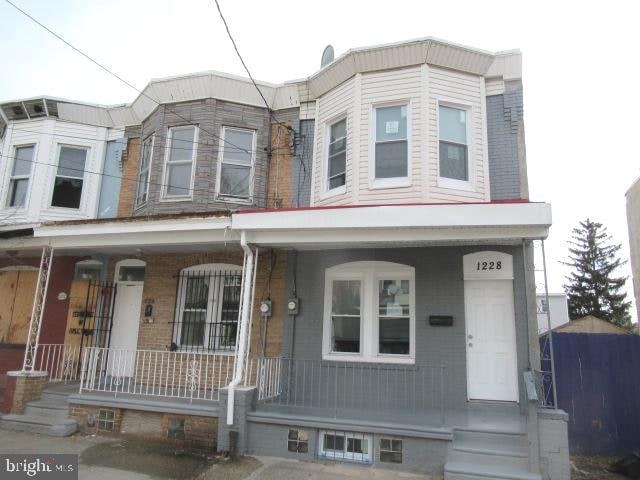 view of property with a porch