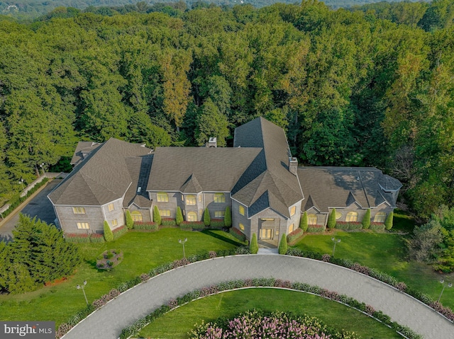 drone / aerial view with a forest view