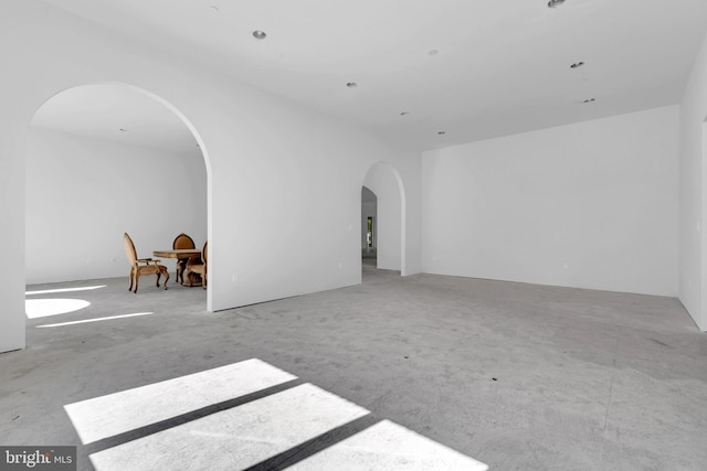 empty room with arched walkways