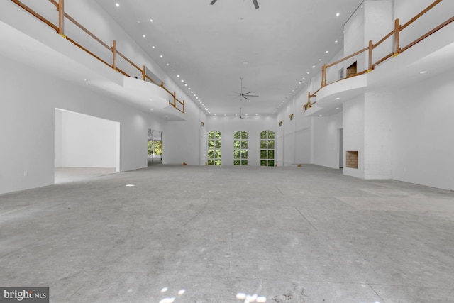 interior space with recessed lighting and ceiling fan