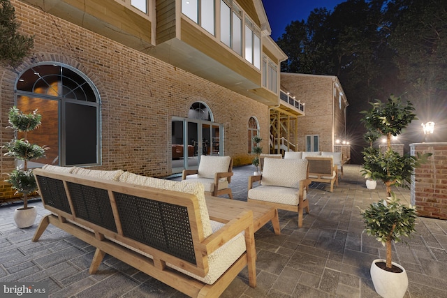 patio at night with an outdoor hangout area