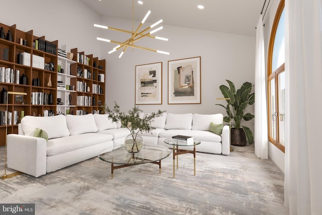 living room with high vaulted ceiling and an inviting chandelier