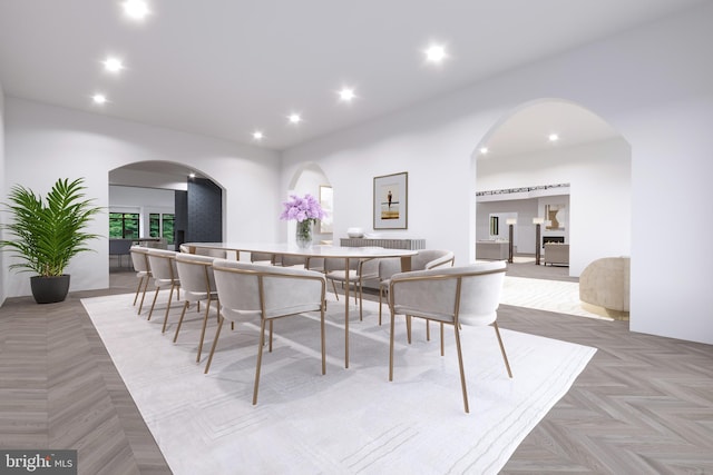 dining area featuring light parquet floors