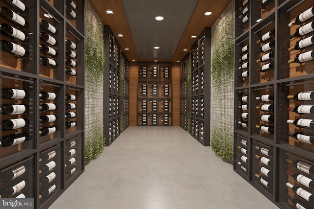 wine area featuring concrete flooring