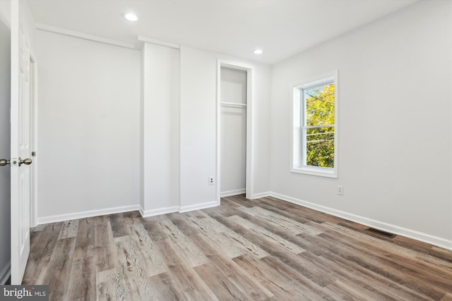 unfurnished bedroom featuring light hardwood / wood-style floors