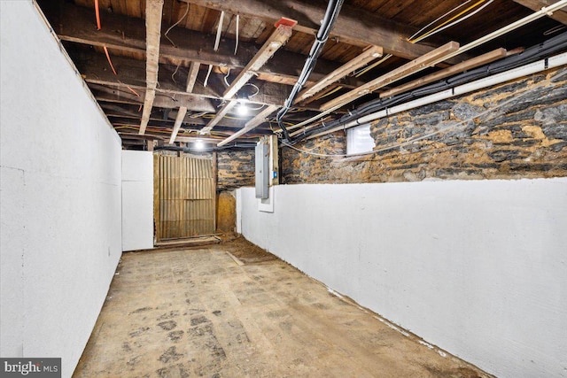 basement with electric panel