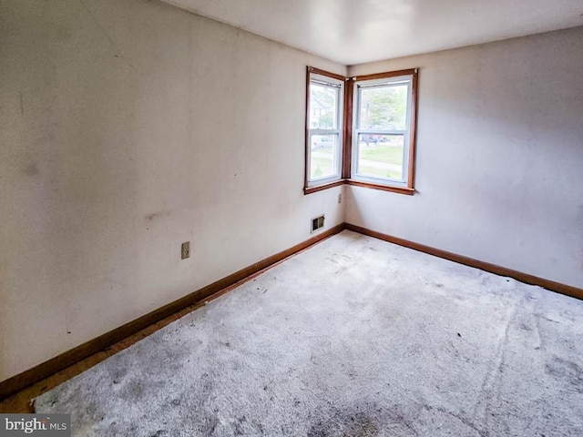 view of carpeted spare room