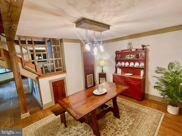 dining room with hardwood / wood-style flooring