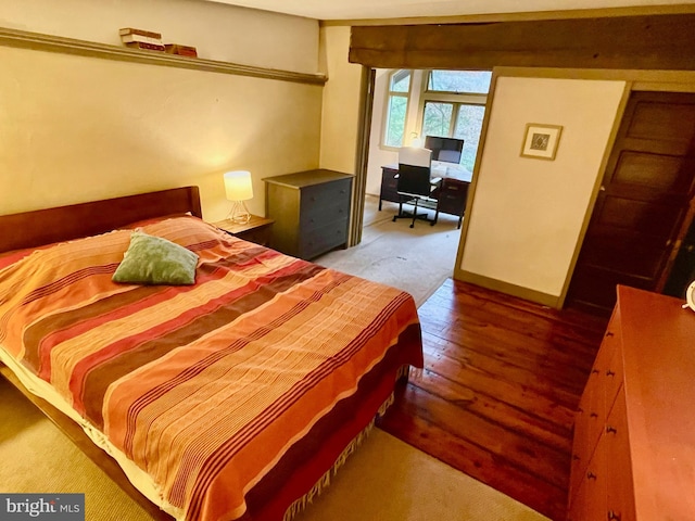 bedroom featuring hardwood / wood-style floors