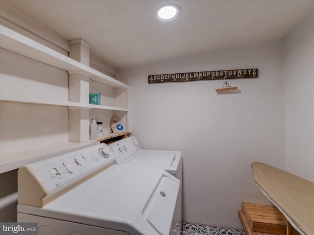 washroom featuring washer and dryer