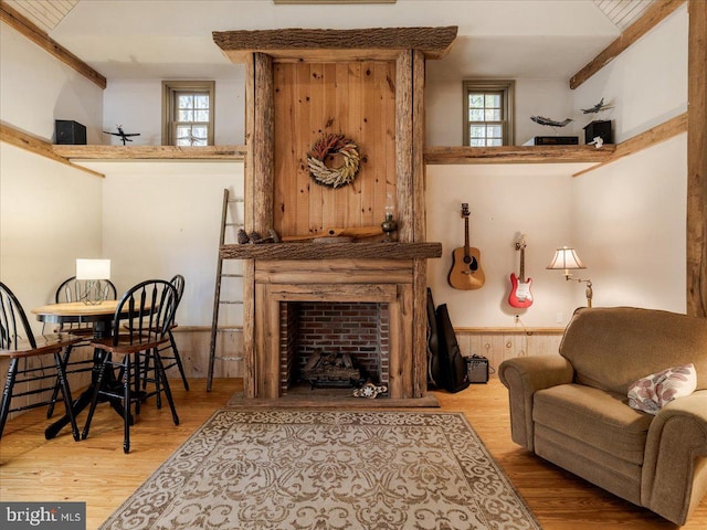 living area with hardwood / wood-style flooring