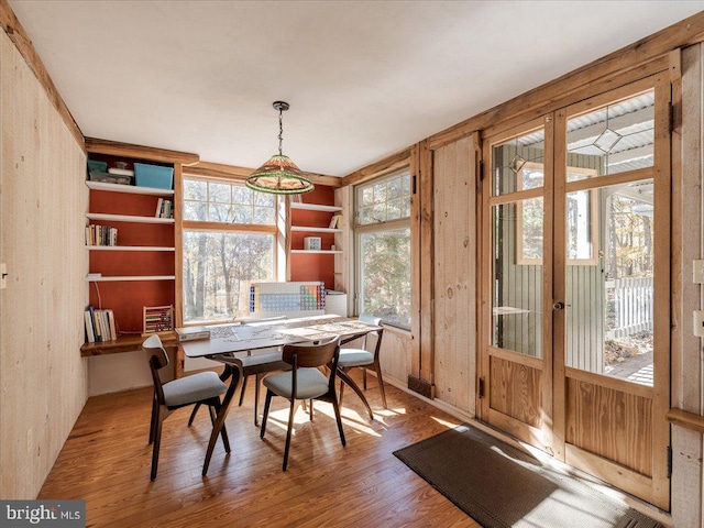 dining area with light hardwood / wood-style floors