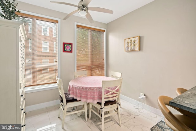 dining area featuring ceiling fan