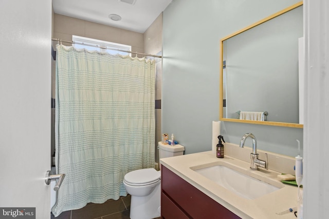 full bathroom featuring vanity, tile patterned flooring, toilet, and shower / bathtub combination with curtain