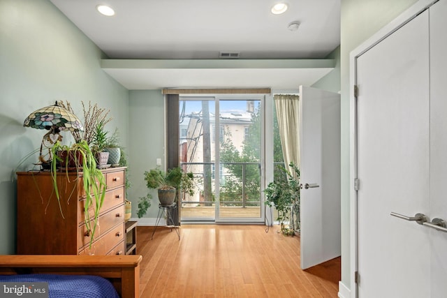 doorway to outside with light hardwood / wood-style flooring