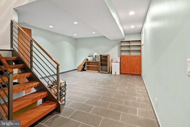 basement with tile patterned flooring