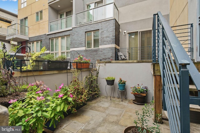 view of patio / terrace with a balcony