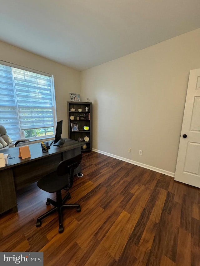 office area with dark wood-type flooring