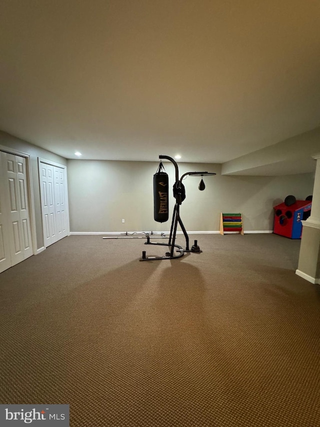 workout room featuring carpet flooring