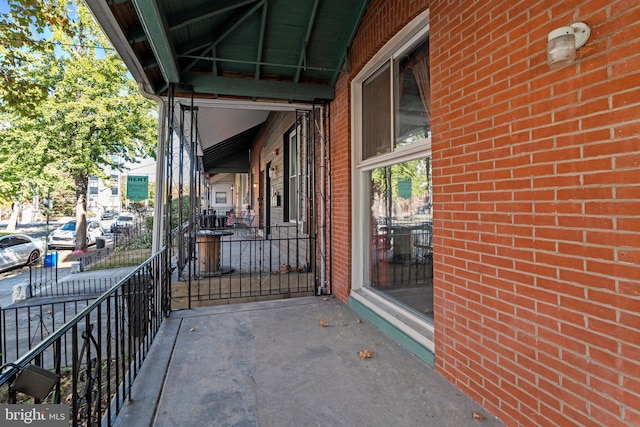 view of patio featuring a porch