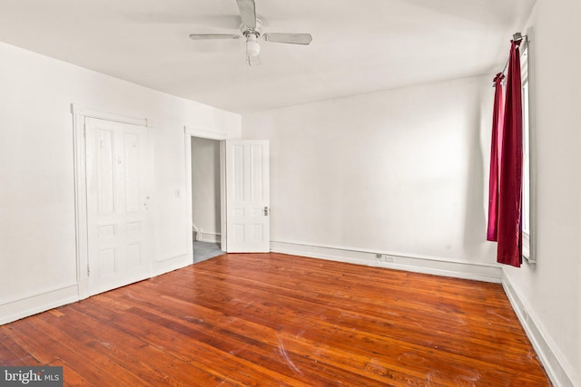 unfurnished bedroom featuring hardwood / wood-style flooring and ceiling fan